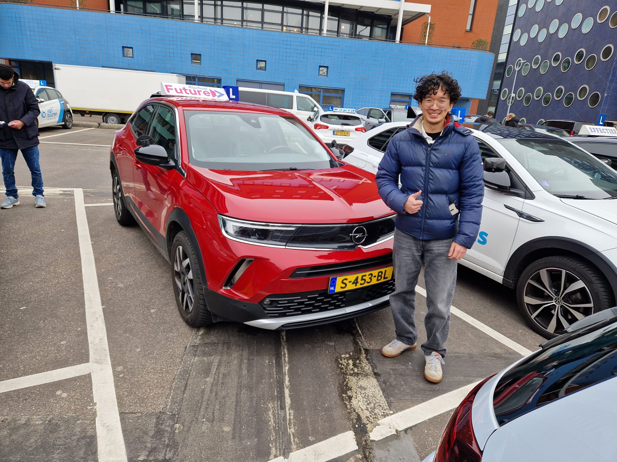 Rode lesauto van Rijschool Future